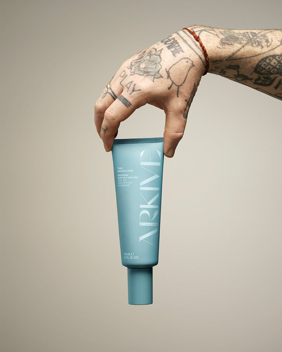 the headliner bottle, a gel for hair by arkive on a white background