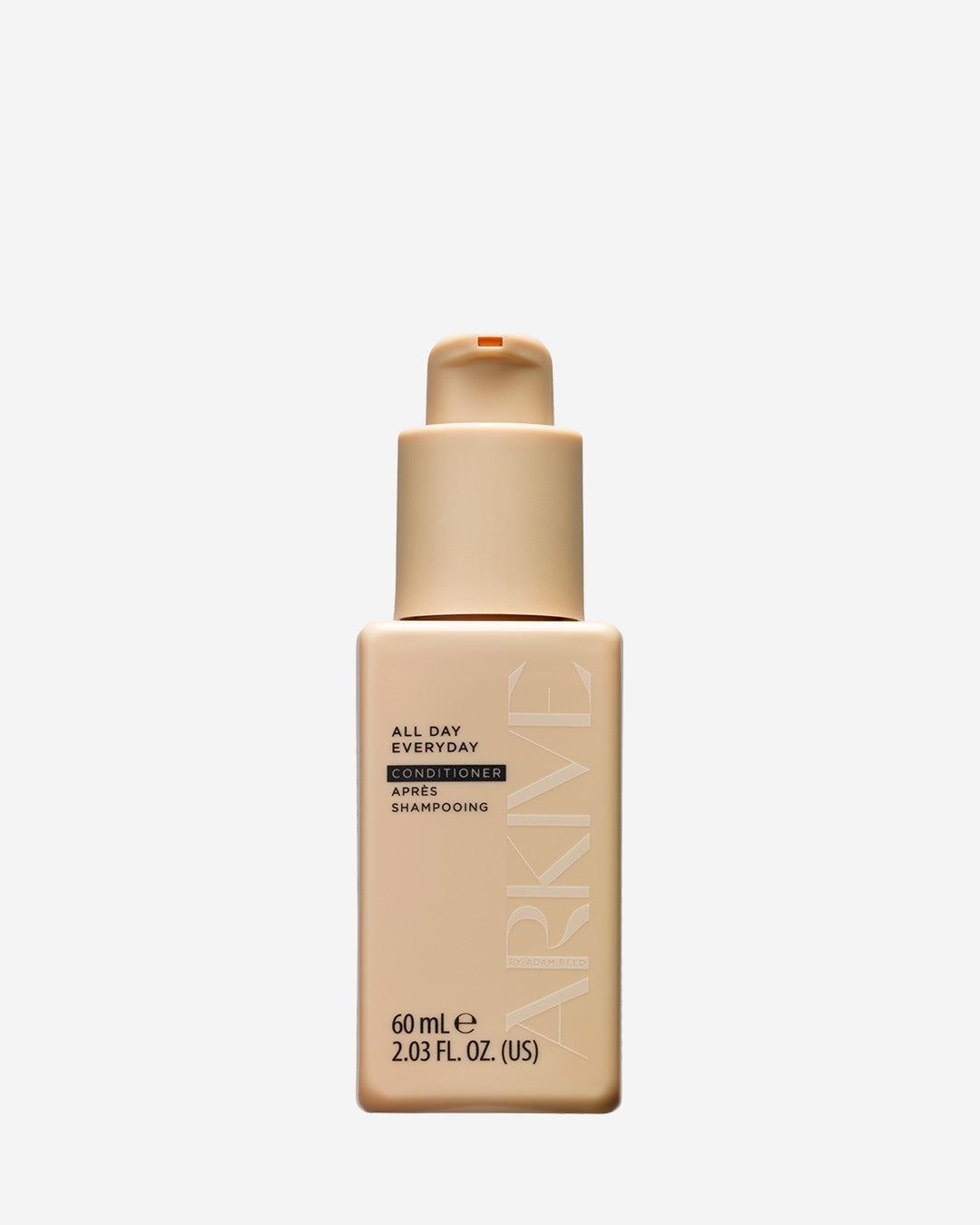 Miniature bottle of Arkive's conditioner on a white background