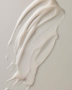 Arkive's innovative gel cream conditioner out of the bottle on a white surface