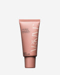 a mini bottle of Arkive scalp scrub on a white background