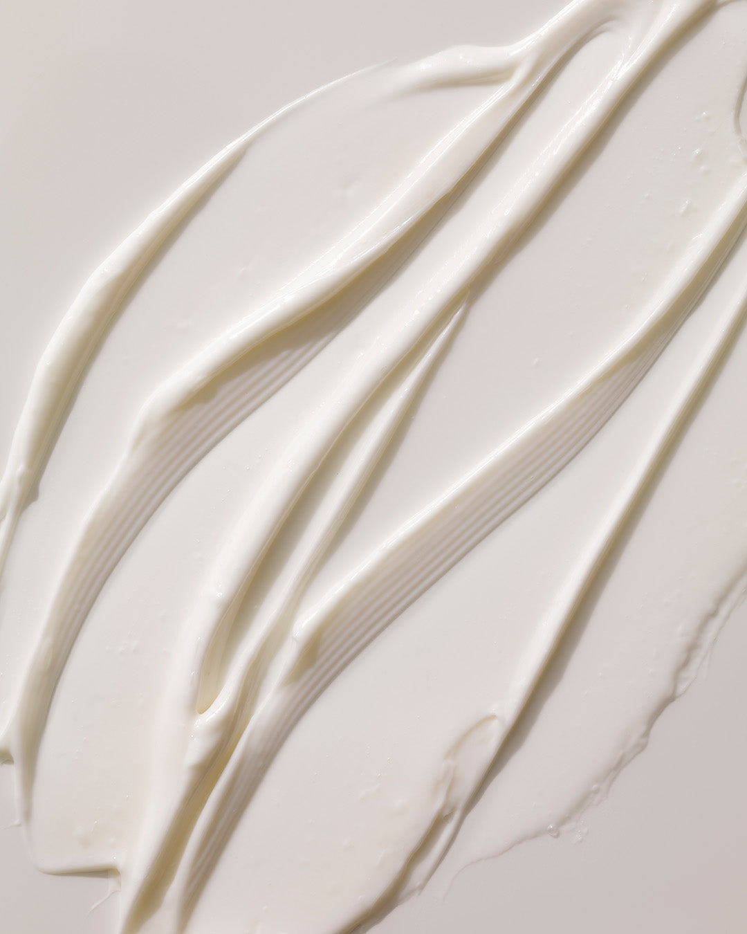 Arkive's The Future Youth hair treatment mask poured onto a white surface