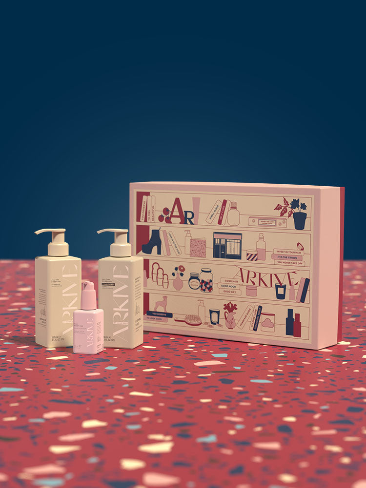 Arkive's Healthiest Hair Ever set laid out on the table, including the decorative box and contents